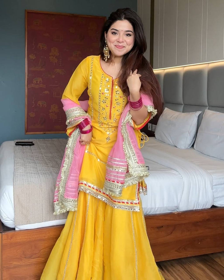 Women's Yellow Embroidered Kurta Sharara Set with Pink Dupatta