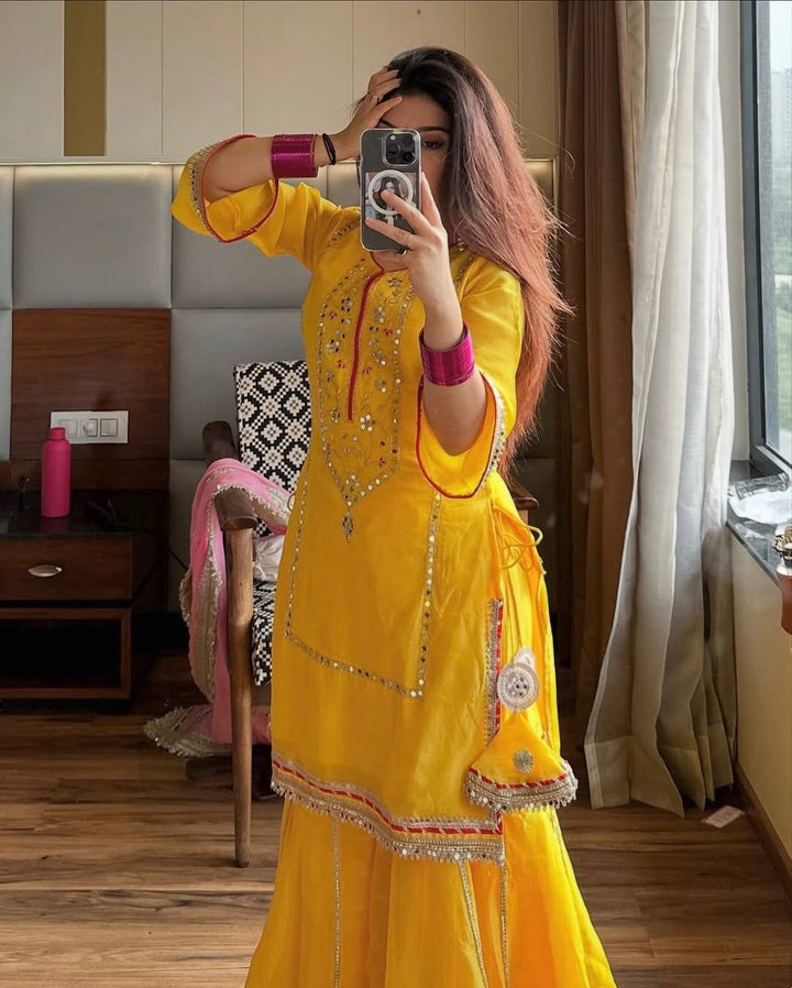 Women's Yellow Embroidered Kurta Sharara Set with Pink Dupatta
